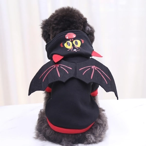 Detail view of black pet bat hoodie with red trim and 3D wings for cats and dogs