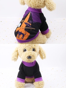 Detail of Halloween pet outfit featuring black cat and ghost patterns on purple fabric