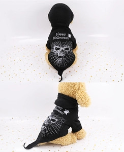 Black Halloween dog hoodie featuring Happy Halloween text and skull spiderweb print