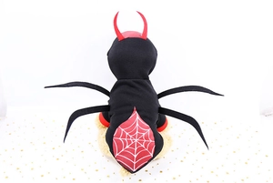 Close-up of spider web pattern and devil horns on fleece Halloween pet costume