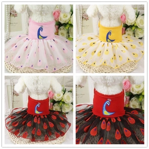 Detail of dog princess dress with exquisite peacock embroidery and layered tulle skirt