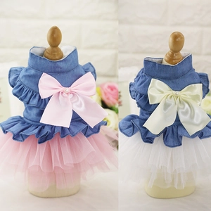 Detail of pet princess dress with denim top, large silk bow, pearl and layered tulle skirt