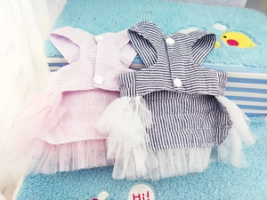 Detail of pink and navy striped pet dresses with multi-layer mesh tutus and button accents