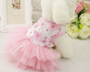 Close-up of pink cherry blossom embroidery and multi-layer mesh on dog tutu dress