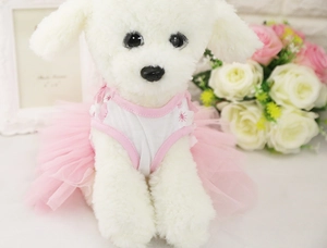 Detail of pink floral dog dress with multilayered mesh tutu skirt and trim