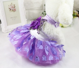 Detail of purple pet wedding dress with leaf sequins and 3D floral decoration