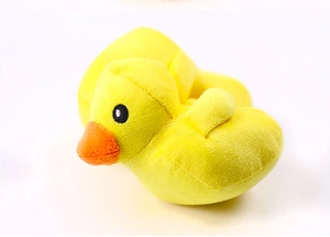 Detailed view of the soft yellow plush duck toy with high-quality black embroidery eyes