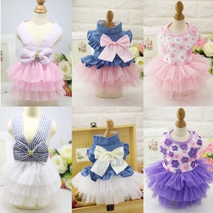 Pet suspender dresses for small dogs and cats featuring striped mesh tutu and bow details