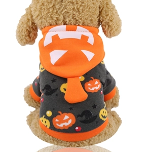 Detail of pumpkin hoodie for dogs with printed jack-o-lantern and witch hat graphics