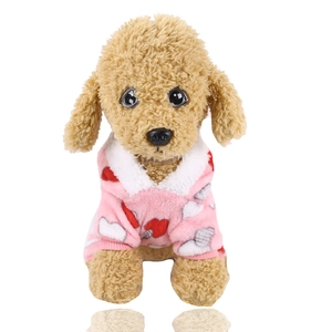 Detailed view of pink fleece pet coat with white faux fur collar and heart patterns