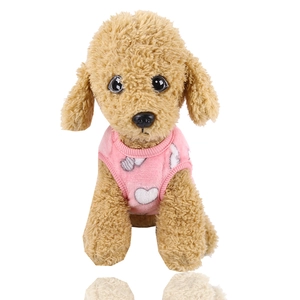 Close-up of pink flannel pet vest with white heart pattern on a plush dog model