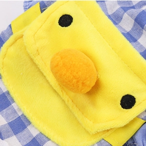 Macro detail of yellow plush duck pocket on blue and white checkered pet costume