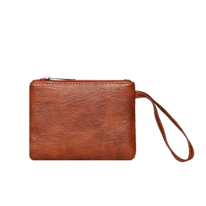 Brown faux leather wristlet purse with litchi texture and metal zipper closure