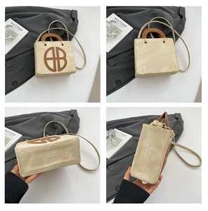Detailed four-way views of a vintage cream canvas handbag with brown round logo detail