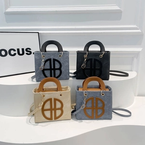 Minimalist square tote bags with AB logo in four colors and textured fabric finish