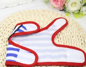 Close-up of blue white striped dog harness with red trim and breathable mesh lining