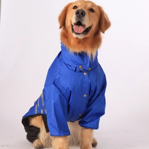 Blue waterproof dog raincoat detail with reflective stripes and snap button closure