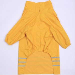 Detail of yellow waterproof dog raincoat with silver reflective safety stripes on back