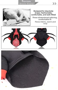 Detail of spider pet costume showing red web pattern and warm fleece fabric texture