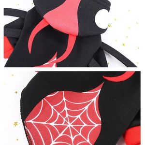 Halloween spider dog costume with red fang hood and white spider web print on back
