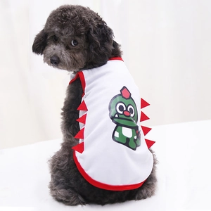 Close-up of a white mesh pet vest with a green dinosaur print and red 3D spikes for dogs
