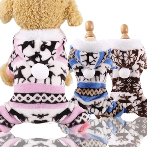 Close-up of coral fleece pet jumpsuits in pink, blue, and brown with festive patterns
