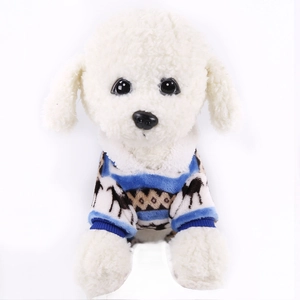 Detailed close-up of blue and white knitted jacquard sweater on a white plush dog toy
