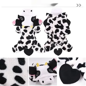 Macro details of soft coral fleece cow pet costume featuring 3D ears and heart-shaped tail