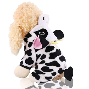 Detail of soft coral fleece pet cow costume featuring 3D hood with ears and horns