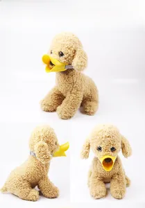 Three-view display of a yellow duckbill muzzle for dogs with adjustable grey straps