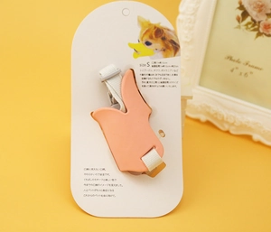 Detailed view of pink silicone duck muzzle for small dogs on Size S display packaging