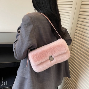 Pink faux fur shoulder bag with silver buckle and soft plush texture for women