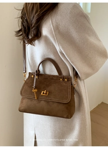 Retro dark brown suede small square bag styled with a minimalist beige coat