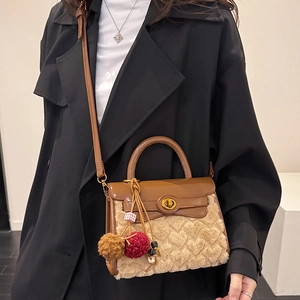 Lambswool Kelly bag with brown leather trim and plush heart texture for women