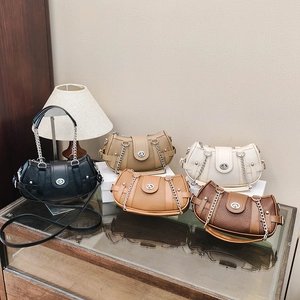 Litchi pattern leather crescent bags with metal chains in black, beige, white, and brown