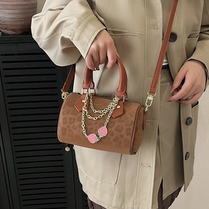 Retro leopard print Boston bag with gold chain and strawberry charm detail