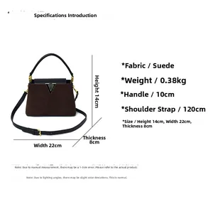 Size chart showing suede handbag dimensions, weight, and strap length details