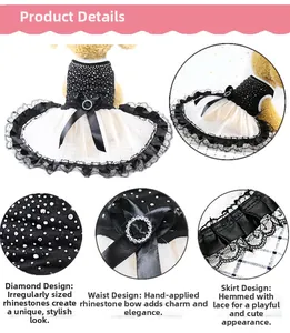 Detail view of pet dress featuring rhinestone patterns, bow belt, and layered lace hem