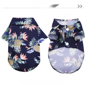 Front and back detail of a Hawaiian style pet shirt with pineapple and floral prints