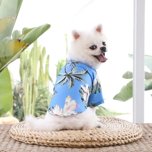 Hawaiian style pet dog shirt with tropical palm and floral prints for summer wear