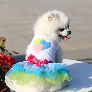 Detail of dog princess dress with embroidered hearts, polka dot bow and tiered tulle skirt