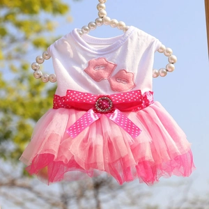 Pink tulle pet princess dress for small dogs and cats with bow and flower details