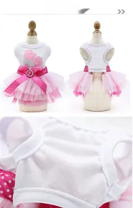 Detail of pet dress featuring heart embroidery, polka dot bow and layered pink tutu skirt