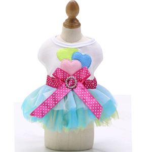 Dog dress with colorful felt hearts and dual-layer mesh skirt on display stand