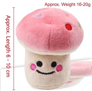 Pink plush mushroom squeaky toy for dogs and cats with cute embroidered smile face