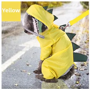 Détail de l'imperméable jaune dinosaure pour chien avec capuche transparente et tissu