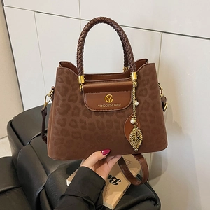Sac Seau À Imprimé Léopard Pour Femme En Cuir PU Poignée Tressée Pendentif Feuille Dorée Grande Kapazität Sac Bandoulière