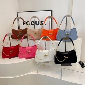 Chic multi-color leather handbag collection with sleek gold chain and bullet clasp detail