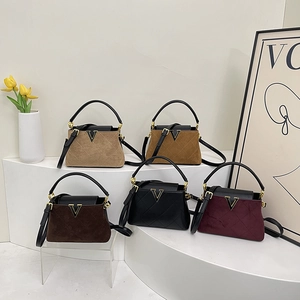 Elegant quilted matte tote bag in five colors with gold V-hardware and shoulder strap