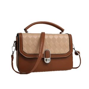 Moderne gesteppte Handtasche im Color-Block-Design mit Schultergurt und Drehverschluss